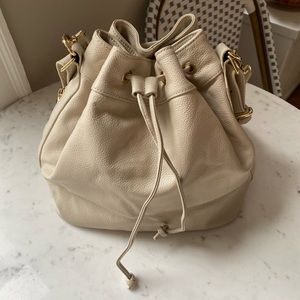 Ora Delphine Claire Bucket Bag in Cream
